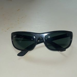 RAY BAN sunglasses.  Used but still a lot of life left in them.